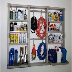 an organized garage storage unit filled with tools