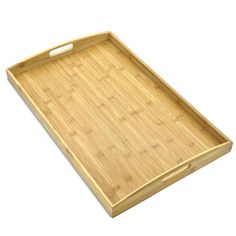 an empty bamboo tray with handles on a white background