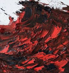 an abstract painting with red and black colors