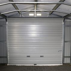 the inside of a garage with an open door