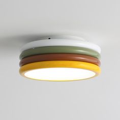 a multicolored ceiling light hanging from the ceiling