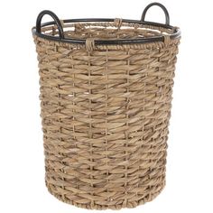 a round wicker basket with black handles