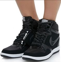 - Nike Force Sky High Top Hidden Wedge Fashion Sneakers - Black / Anthracite - Mesh / Patent Leather - Rubber Sole - Cushioned Insole - Hidden Wedge Sockliner - Cupsole Midsole - Rubber Sole With Classic Basketball Pattern - Similar To Nike Dunk Sky / Heels / Platforms / Lifts / Adidas Wedges / Converse Wedges Nike Sky High Wedge, Converse Wedges, Basketball Pattern, Cole Haan Women Shoes, Nike Kaishi, Nike Wedges, Hidden Wedge Sneakers, Black Wedge Sneakers, Studded Shoes