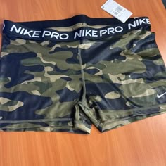 Old Nike Pro Shorts, Green Nike Pro Shorts, Nike Pro Camo, Camo Nike Pros, Nike Pro Camo Shorts, Nike Pro Shorts Girls, Track Uniforms, Nike Winter Jackets, Caramel Drinks