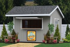 a gray shed with a sign that says hot dogs on the front and side wall