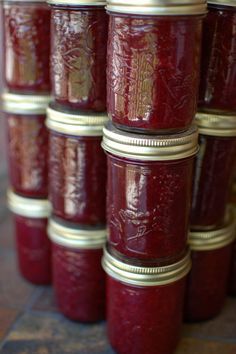 many jars are stacked on top of each other