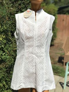 Here is a vintage 1970s new old stock tennis dress . Has original Hangtags .Made by JB Tennis.Size 14.Following are the measurements. Bust 36" waist 34",Hips 40",Length 29".Zips up the front.Lace fabric.Please take special consideration of measurements. 1970s sizing was very small to today's standards. Tennis dresses were very short not like a regular dress. So please take special note of length. If you live overseas please email me first before purchasing for mailing cost. Price quoted is for USA only 70s Tennis, Tennis Dresses, Breathe Out, Womens Sports, Tennis Dress, Vintage 1970s, Lace Fabric, Vintage 70s, Sports Women