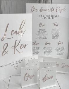 the wedding stationery is laid out and ready for guests to sign their names on