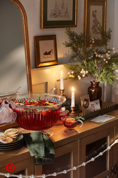 a table topped with plates and bowls filled with food