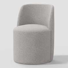 an upholstered chair with a circular seat and foot rest in grey fabric, viewed from the front