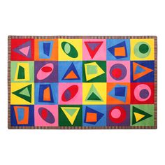 a colorful rug with various shapes on it