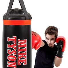 Train like the greatest Iron Mike with the brand new Mike Tyson Kids Boxing Punching Bag Set. This amazing officially licensed boxing set comes with a pair of boxing gloves with Mike Tyson's autograph, a punching bag, and a sound FX speaker. Combining exercise and play while also improving agility and hand-eye coordination, your kid will be punching like Mike Tyson and having a blast! Color: Red. Mike Tyson Boxing, Boxing Punching Bag, Boxing Punches, Iron Mike, Like Mike, Tech Toys, Sports Toys, Punching Bag, Mike Tyson