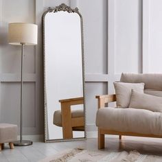 Discover the allure of simplicity and elegance with our Silver Leaner Mirror. This exquisite piece, framed with delicate silver edges, is a testament to classic design and sophistication. Designed to lean against any wall, its arched shape and reflective beauty not only enhance your space but also bring in an abundance of natural light, making any room appear larger and more inviting. Size: 22" x 64".  Color: Black. Leaner Mirror, Mirror Shop, Crystal Art, Home Decor Mirrors, Mirror Decor, Natural Light, Classic Design, Arch, Full Length