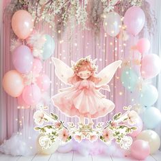 a pink fairy themed backdrop with balloons and flowers