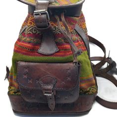 Handmade Leather Backpack Designed Specifically For Women. Made With Care In The High Andean Regions, This Versatile Piece Perfectly Combines Tradition With Functionality. This Backpack Is Handmade By Peruvian Artisans In Cusco. Measure 13 Inches Artisan Backpack For Travel, Artisan Travel Backpack, Daily Use Multicolor Leather Backpack, Daily Use Backpack With Leather Trim, Leather Trim Shoulder Backpack For Daily Use, Multicolor Leather Standard Backpack, Leather Backpack Shoulder Bag With Leather Trim, Bohemian Leather Bag For Trips, Bohemian Leather Bag For Travel