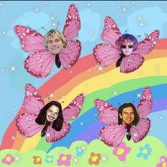 three girls with pink butterflies on their faces and rainbow in the background, all smiling