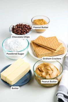 the ingredients for peanut butter are shown in bowls and on plates, including graham crackers