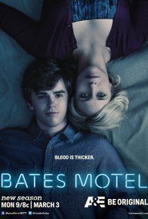 a man and woman laying in bed with the caption bates motel above them