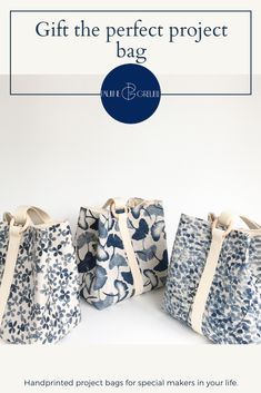 four blue and white bags with the text, gift the perfect project bag