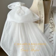 Make your child’s 1st Communion Dresses an unforgettable day with this stunning couture First Communion dress. Designed for elegance and sophistication, this high-low tulle ruffle gown is the perfect choice for families who value craftsmanship and luxury. Handmade details on the bodice elevate the gown, creating a timeless look ideal for such a special occasion. This First Communion dress features a unique high-low hemline crafted from layers of delicate tulle, adding a modern twist to a traditi Princess Dresses Kids, White Tulle Dress, Girls Ball Gown, High Low Gown, Tulle Balls, Girls Easter Dresses, Communion Dresses, Long Train, Floor Length Skirt