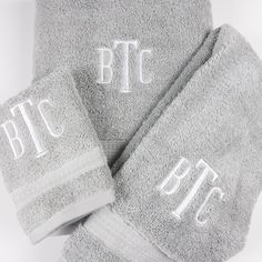 three towels with the letters btc on them