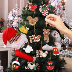 a christmas tree with ornaments hanging from it