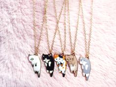 A cute cat necklace ♡ Choose between 5 different colors Necklace chain is 17.5" (45cm), plus an additional 2" (5cm) chain to adjust Cat charm is 2.5cm Chat Kawaii, Necklace Cat, A Cute Cat, Cat Charm, Kawaii Cat, Cat Necklace, Dangle Charms, Necklace Chain, Chains Necklace