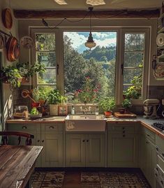 a kitchen filled with lots of green plants next to a large window covered in pots and pans