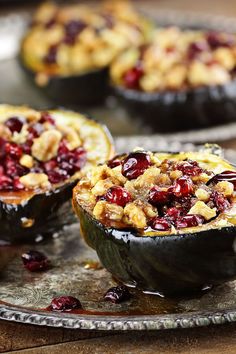 baked desserts with cranberries and walnuts on a plate