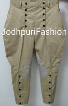 a pair of pants with buttons on the side