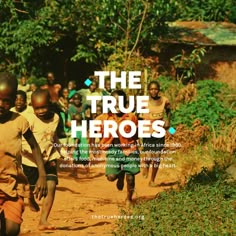 children running down a dirt road with the words true heros on it's side