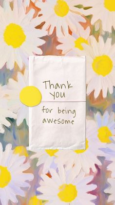 a piece of paper with the words thank you for being awesome written on it in front of white and yellow daisies