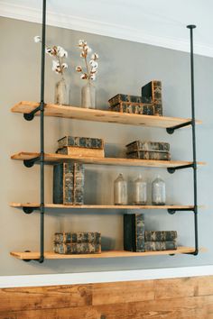 the shelves are made out of wood and metal