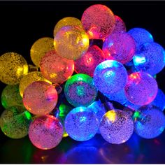 multicolored christmas lights on a black background