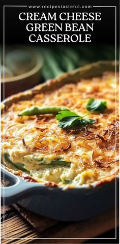 a cheesy green bean casserole in a blue dish on a wooden table