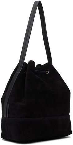 Lightweight suede shoulder bag in black. · Fixed shoulder strap · Drawstring closure · Patch pocket at interior · Canvas lining · H11 x W14.5 x D6 Supplier color: Black Chic Suede Bucket Bag With Removable Pouch, Chic Suede Bucket Bag With Suede Lining, Formal Suede Shoulder Bag With Adjustable Strap, Formal Suede Bags With Suede Lining, Black Suede Luxury Shoulder Bag, Black Suede Bag For Formal Occasions, Luxury Black Suede Shoulder Bag, Suede Shoulder Bucket Bag, Black Leather Bag With Suede Lining