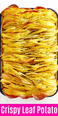 crispy leaf potatoes in a baking pan with text overlay that reads crispy leaf potatoes