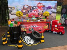 cars themed birthday party with toys and decorations