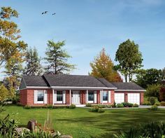 a red brick house with white shutters in the front yard and trees around it