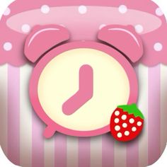 a pink alarm clock sitting on top of a cupcake with a strawberry next to it