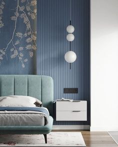 a bedroom with blue walls and white furniture