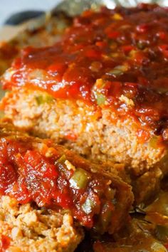 sausage and peppers meatloaf on foil with text overlay