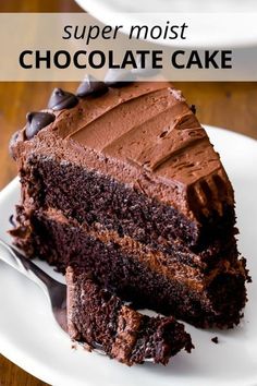 a slice of chocolate cake on a white plate with the words super moist chocolate cake