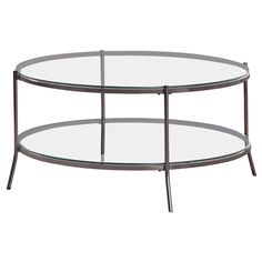 an oval glass coffee table with metal legs and two tiered shelves on each side