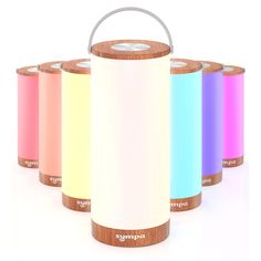 four different colors of the same color can be seen in this set of portable speakers