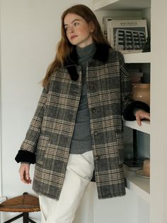 Editor's NotesThis is a midi length coat with a check pattern that gives off a warm feel. It can be created as a high neck by adding a tap to the neck and can also be styled with a color matching collar, making it highly versatile.- Large square pocket added to the front- Open and close with button- Color-coordinated roll-up design at the end of the sleeves- Easy to wear with dropped shoulderMeasurements(in.)ONE SIZE (XS-M)- Length: 31.89 in.- Bust: 49.61 in.- Sleeve: 20.87 in.*Model size: Height 5'58*There may be difference on the measuring method/location.Composition & Care- 50% Wool, 50% Polyester- Dry cleaning- Hand washDesigner- by Cest Moidew Wool Coat Outfit, Plaid Winter Coat, Cute Winter Coats, Winter Coat Outfits, Square Pocket, Plaid Wool Coat, Travel Dress, Tweed Coat, Plaid Coat