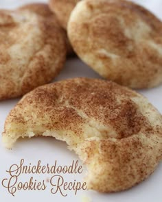 four cinnamon sugar cookies on a white plate