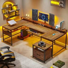 a computer desk with yellow lights on it