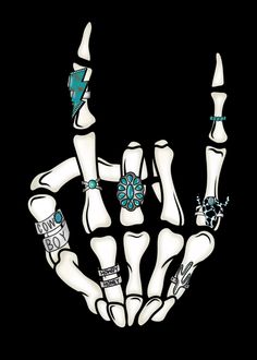 an image of a hand that is made out of bones and turquoise jewels on it