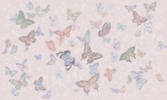 a group of colorful butterflies flying through the air on a pink wallpapered background